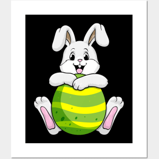 Beautiful bunny with an easter egg Posters and Art